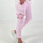 Trousers with crocheted flower inserts - pink