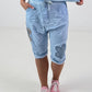 Short Baggy Shorts with Crocheted Flowers and Sequins - Light Blue
