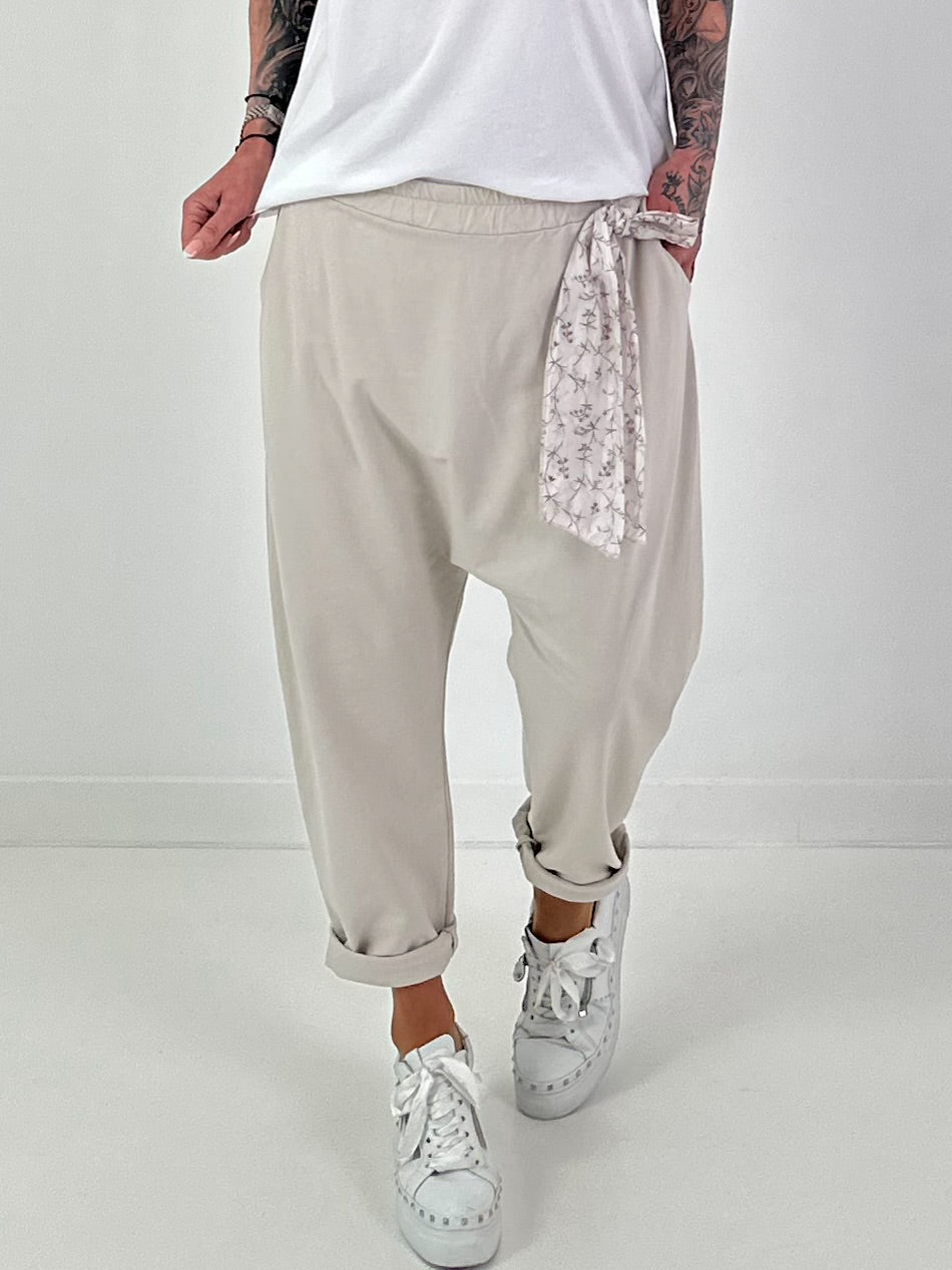 Baggy pants with decorative scarf - beige