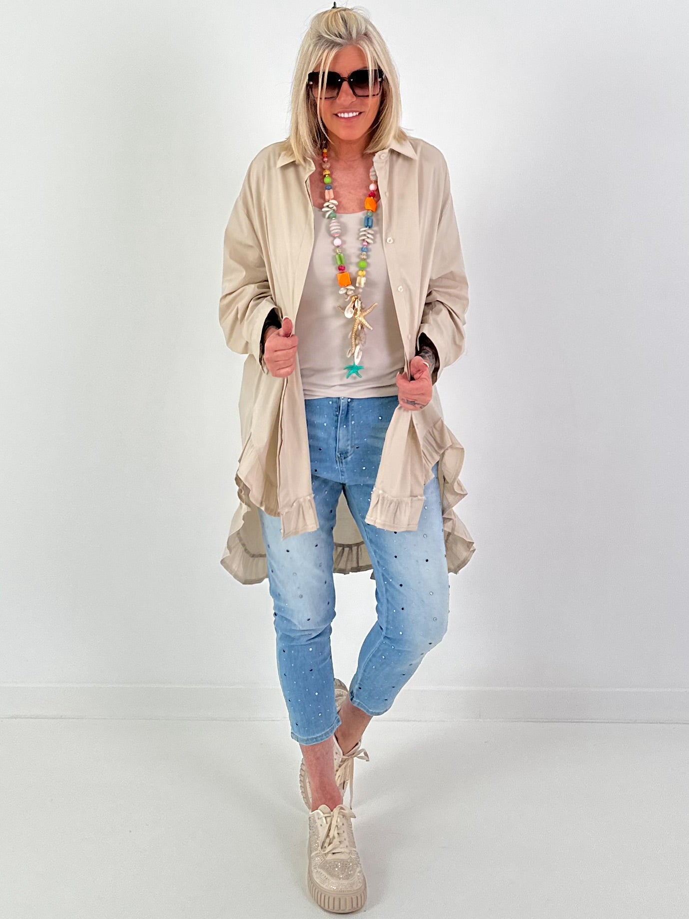 Oversized blouse met ruches – beige