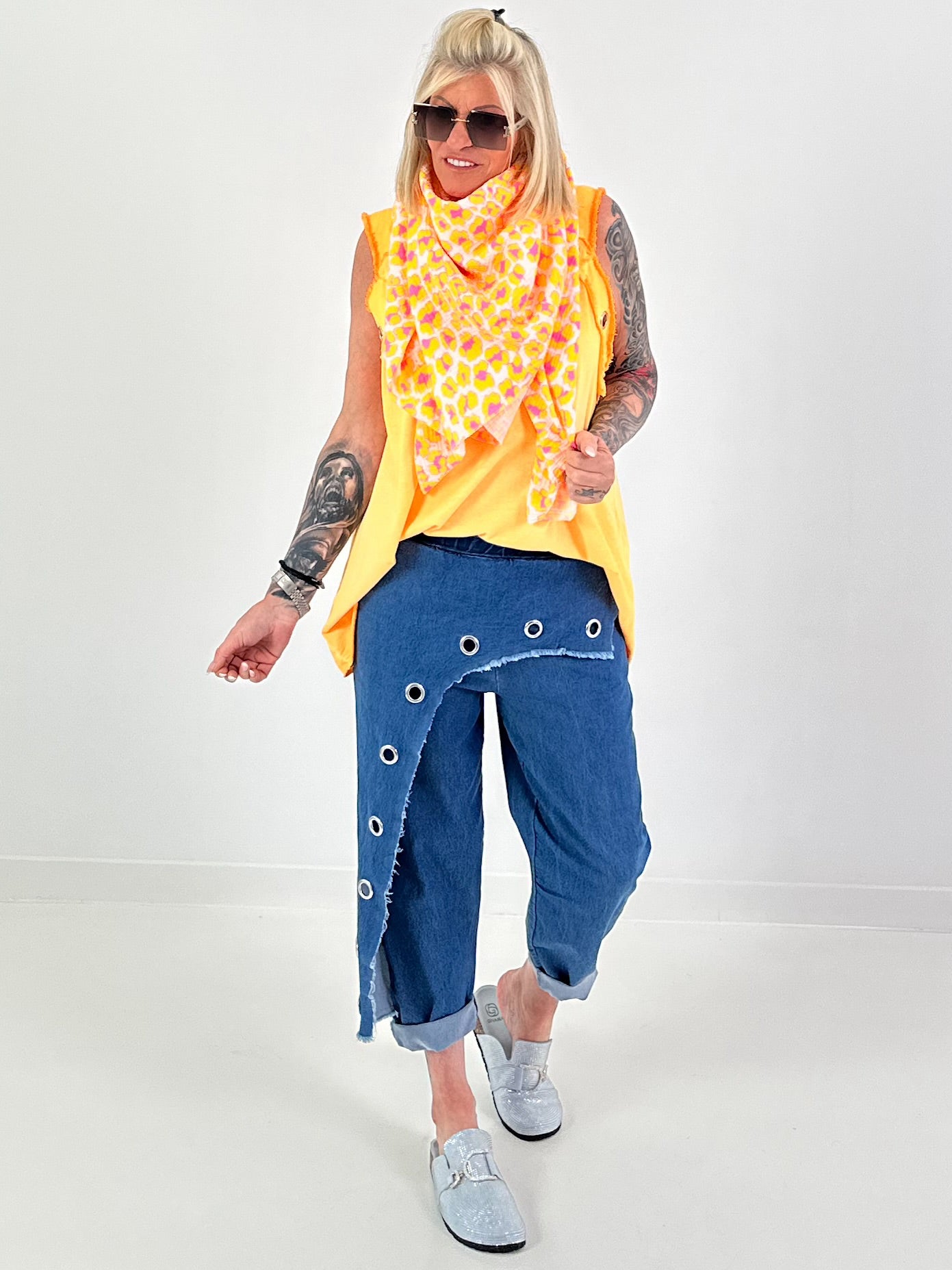 Oversized top with silver eyelets - neon orange