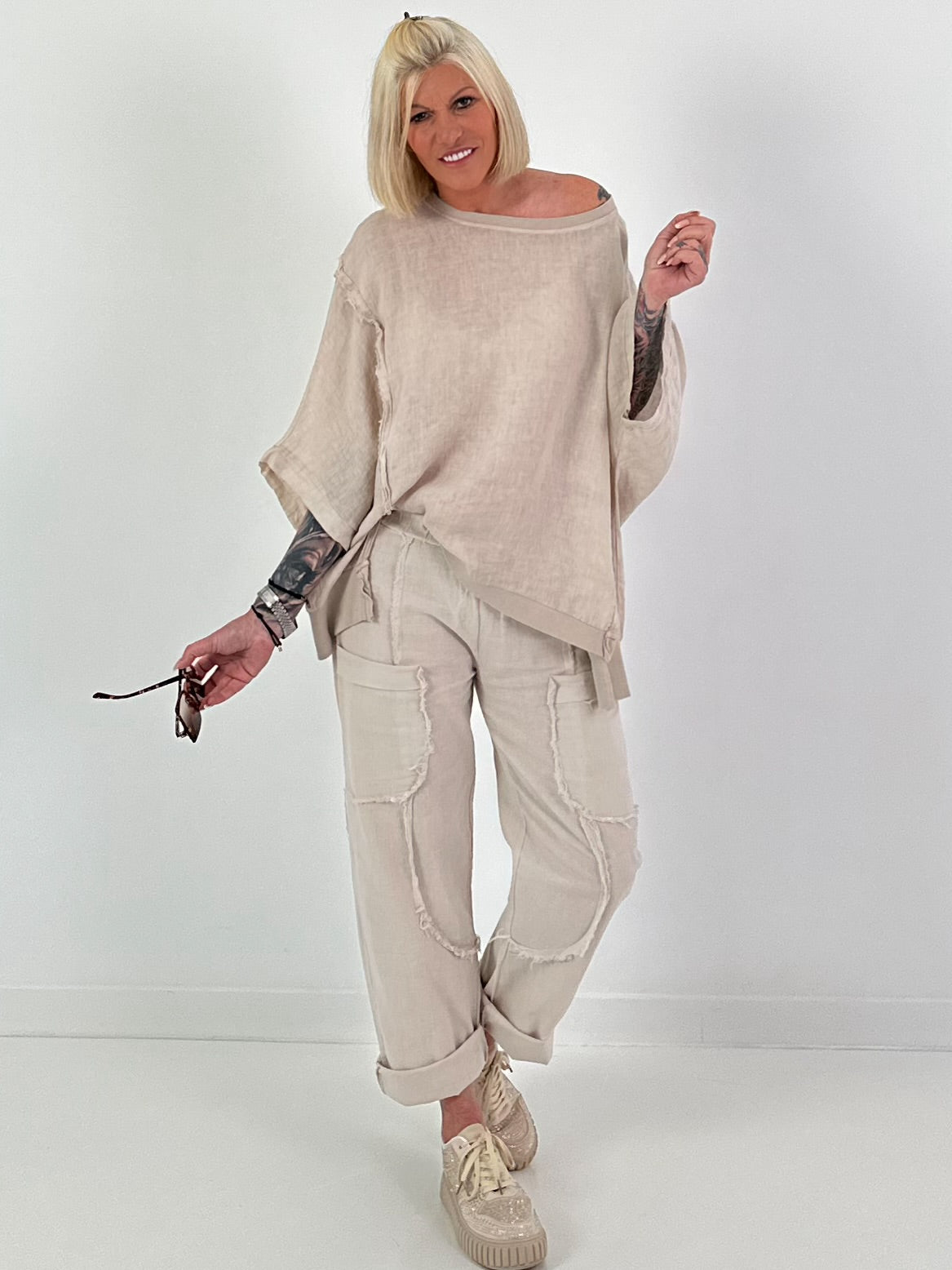 Linnen broek met opgestikte zakken en franjes - beige