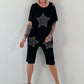 T-Shirt mit Häkelstern-Nieten-Cut-Outs - schwarz