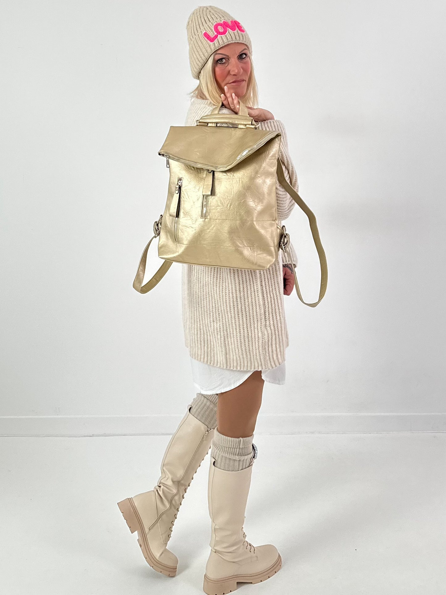 Leather-look backpack, model "City Fold" - gold
