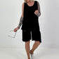 Top with cut-out and asymmetrical hem - black