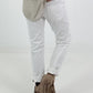 Jeans with crocheted floral appliqués - white