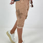 Short baggy shorts with crocheted flowers and sequins - camel