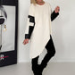 Asymmetrischer Sweater mit Kreuz- und Lederoptik-Details - creme