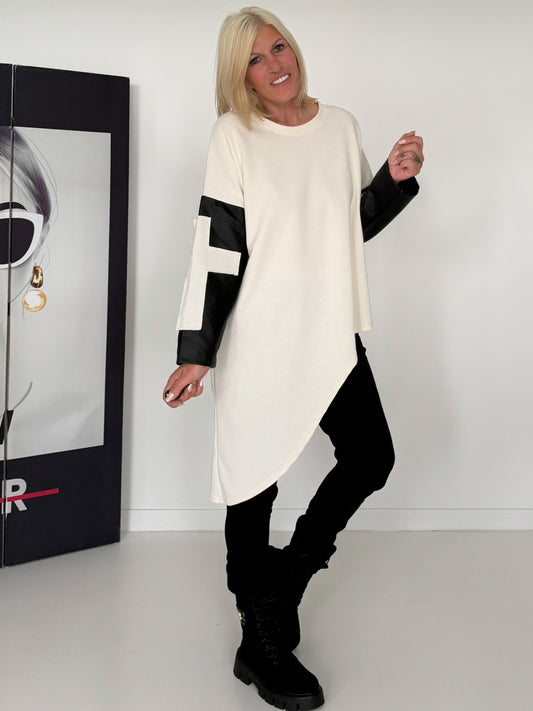 Asymmetrical sweater with cross and leather-look details - cream