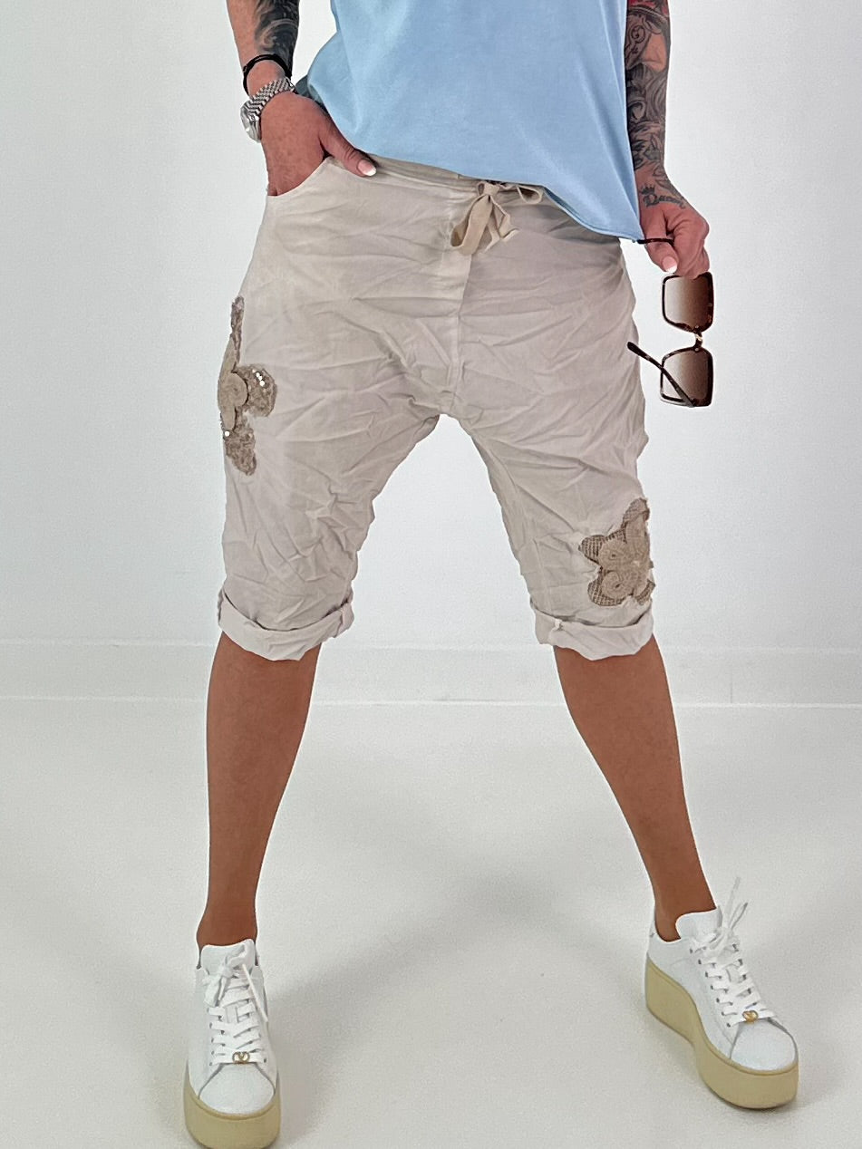 Short Baggy Shorts with Crocheted Flowers and Sequins - Beige