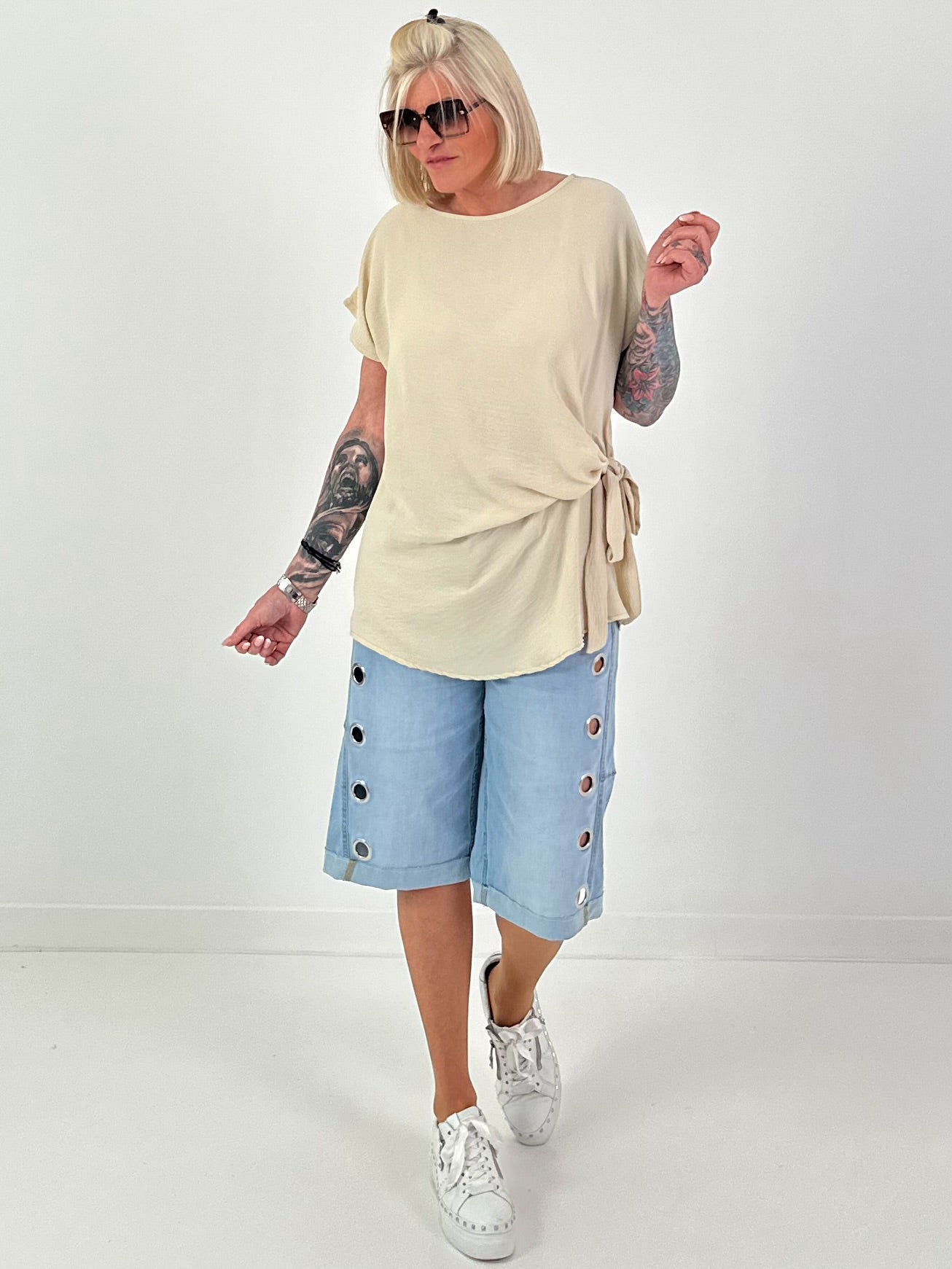Blouse met strikknoop aan de zijkant - beige