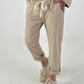 Hose mit goldenen Nieten-Details - beige