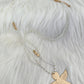Necklace with angel pendant - white gold