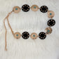 Chain belt with ornamental details - gold and black