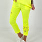 Pants with crocheted flowers - neon yellow