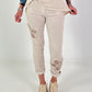 Trousers with crocheted flower inserts - beige