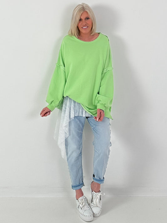 Oversized sweater with trendy left seams - green
