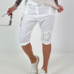 Short baggy shorts with crochet flowers and sequins - white