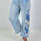 Jeans with floral crochet inserts at the sides - denim