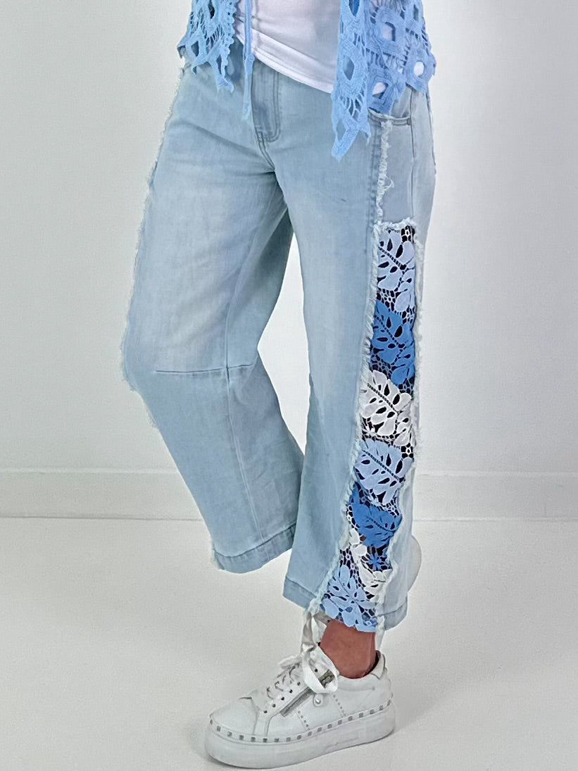 Jeans with floral crochet inserts at the sides - denim