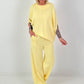 Two-piece set with asymmetrical shirt - yellow