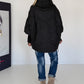 Oversized Steppjacke mit Stulpenärmeln und Kapuze - schwarz