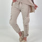 Trousers with crochet flowers and patch pockets - beige