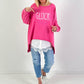 Oversized stonewashed Sweatshirt Modell "Glück..." - pink