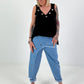 Oversized top with silver eyelets - black
