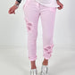 Trousers with crocheted flower inserts - pink