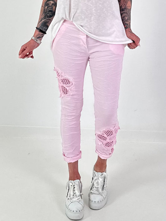 Trousers with crocheted flower inserts - pink