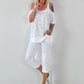 Shirt mit Cold Shoulder und Leo Strass - weiss