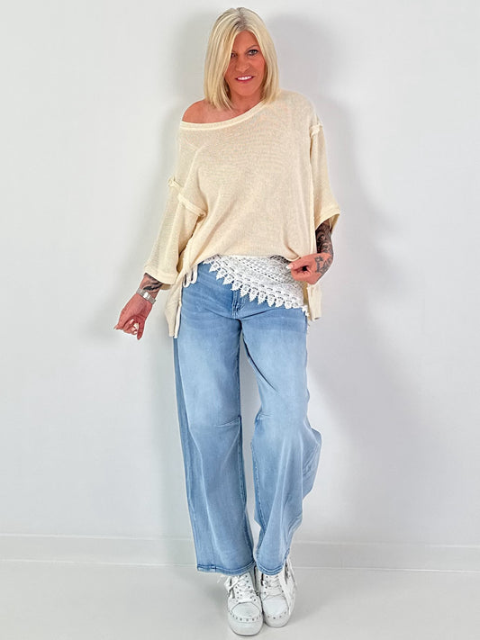 Oversized Strickpulli mit kurzen Ärmeln und Außennähten - creme