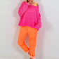Crochet jumper with back cut-out - neon pink