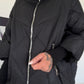 Oversized Steppjacke mit Stulpenärmeln und Kapuze - schwarz