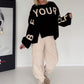Sweater mit Strickeinsätzen - schwarz