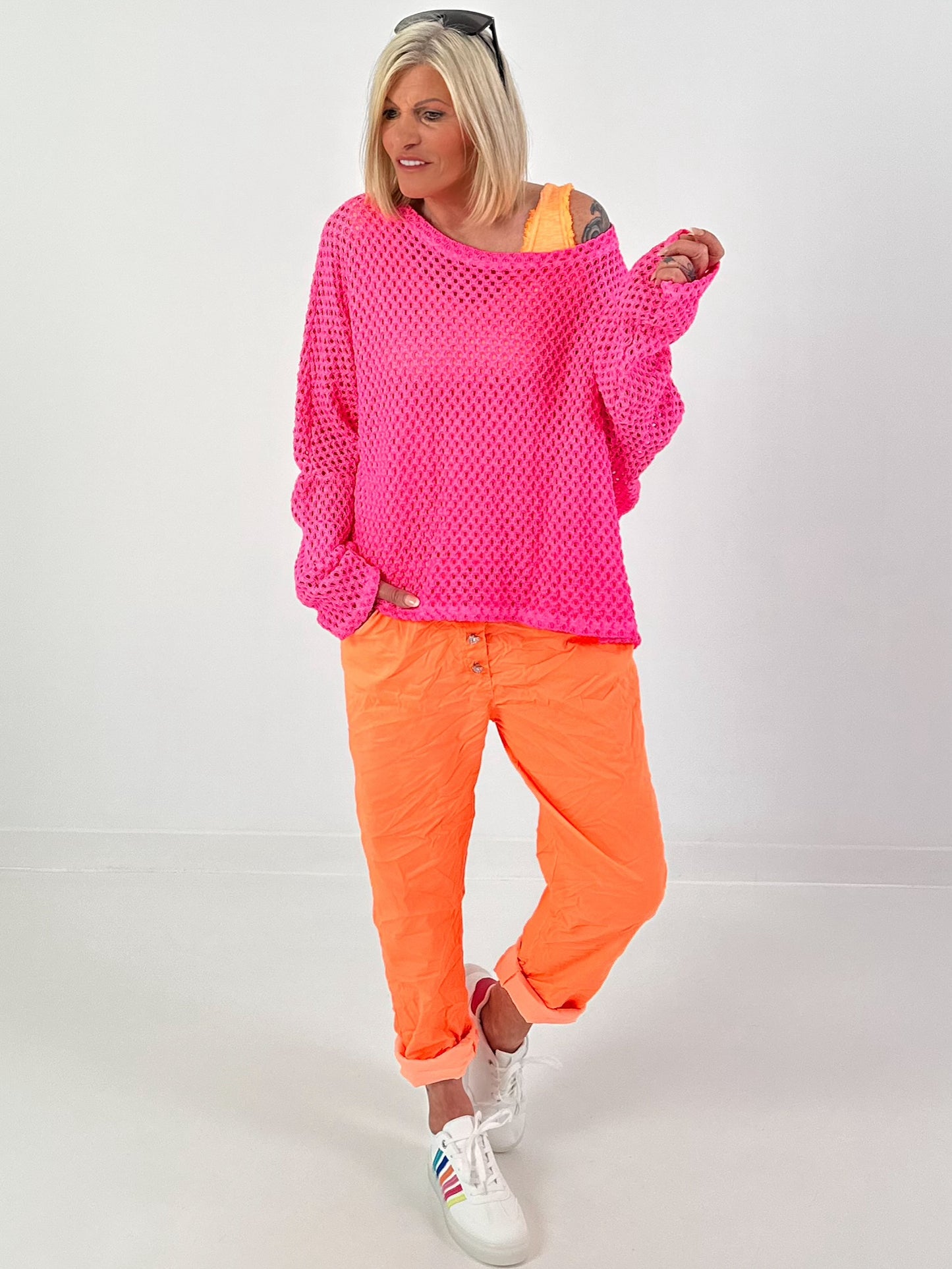 Crochet jumper with back cut-out - neon pink