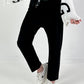 Trousers with wide pleats - black