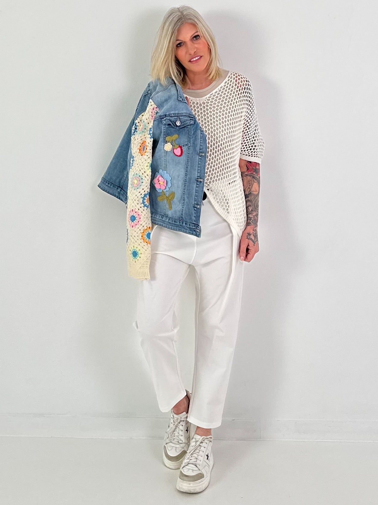 Denim jacket with crocheted sleeves - denim