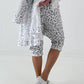 Stylische Hose mit Überwurf im Knit-Look - weiss