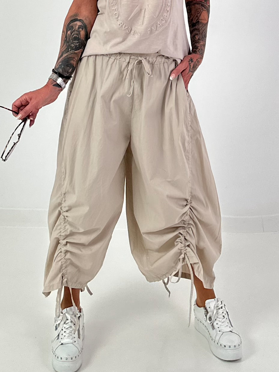 Balloon trousers with gathering seams - beige