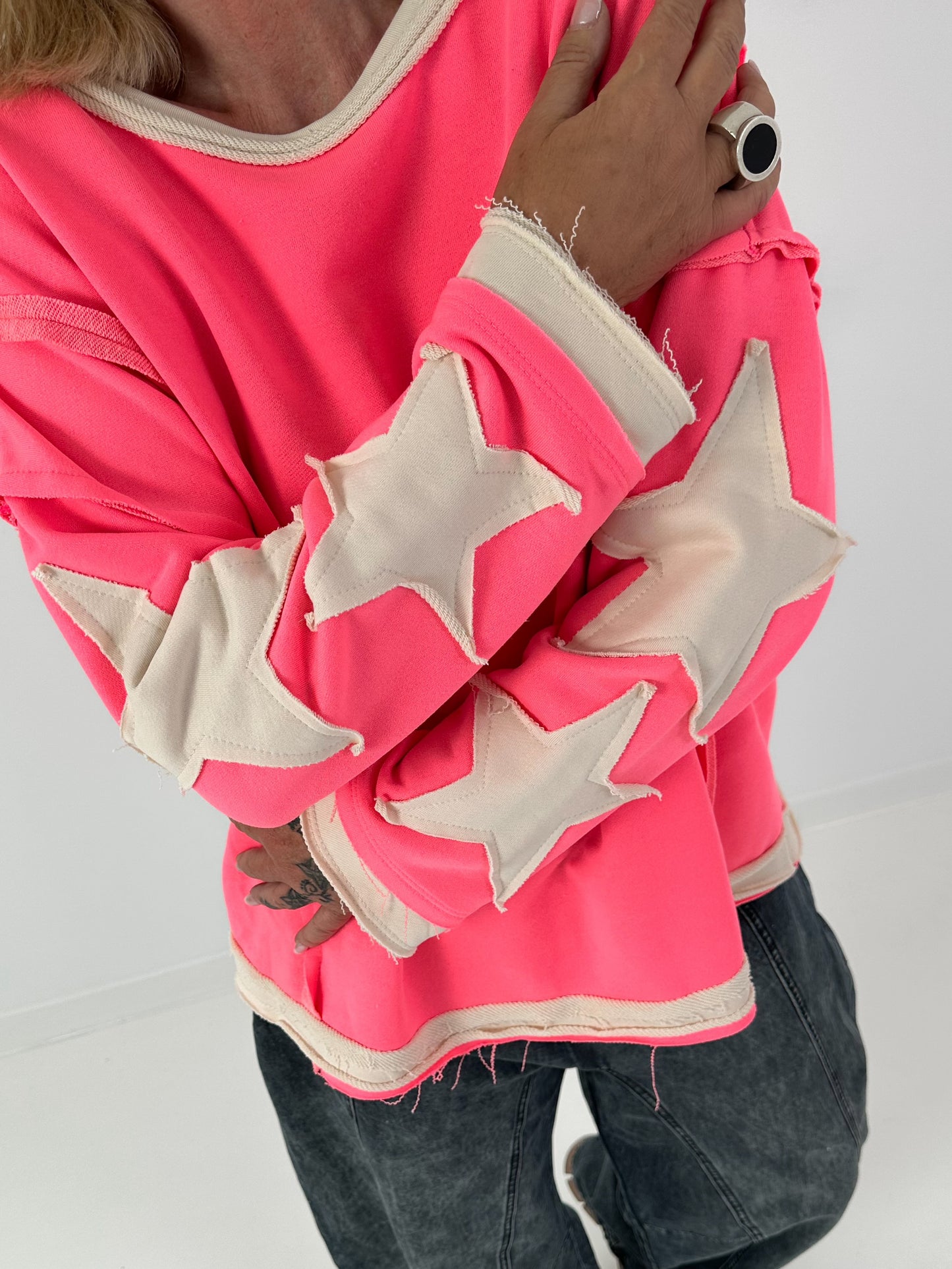 Sweatshirt with trendy star elements - neon pink