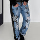 Boyfriend Jeans mit allover Sternen-Print und Ledereinsätzen - schwarz-denim