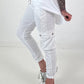 Trousers with crocheted flowers and patch pockets - white