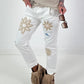 Jeans with crocheted floral appliqués - white