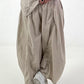 Balloon trousers with gathering seams - beige