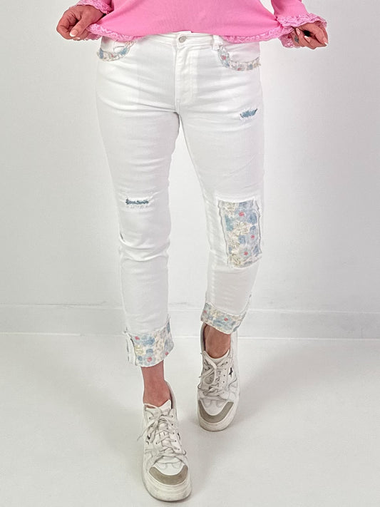 Jeans mit Spitzeneinsätzen floral- weiss