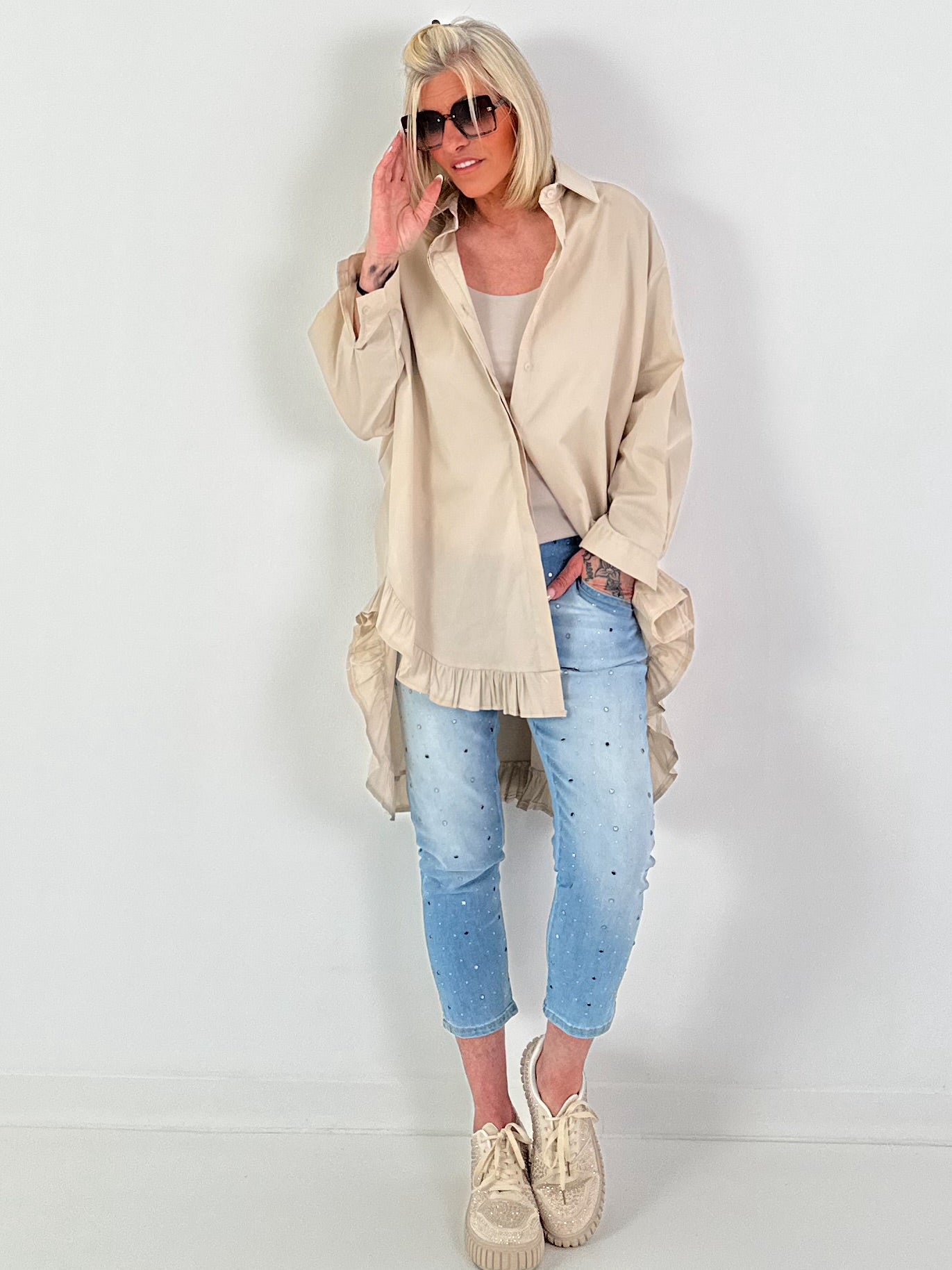 Oversized blouse met ruches – beige