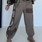 Hose mit City-Statement-Print - taupe