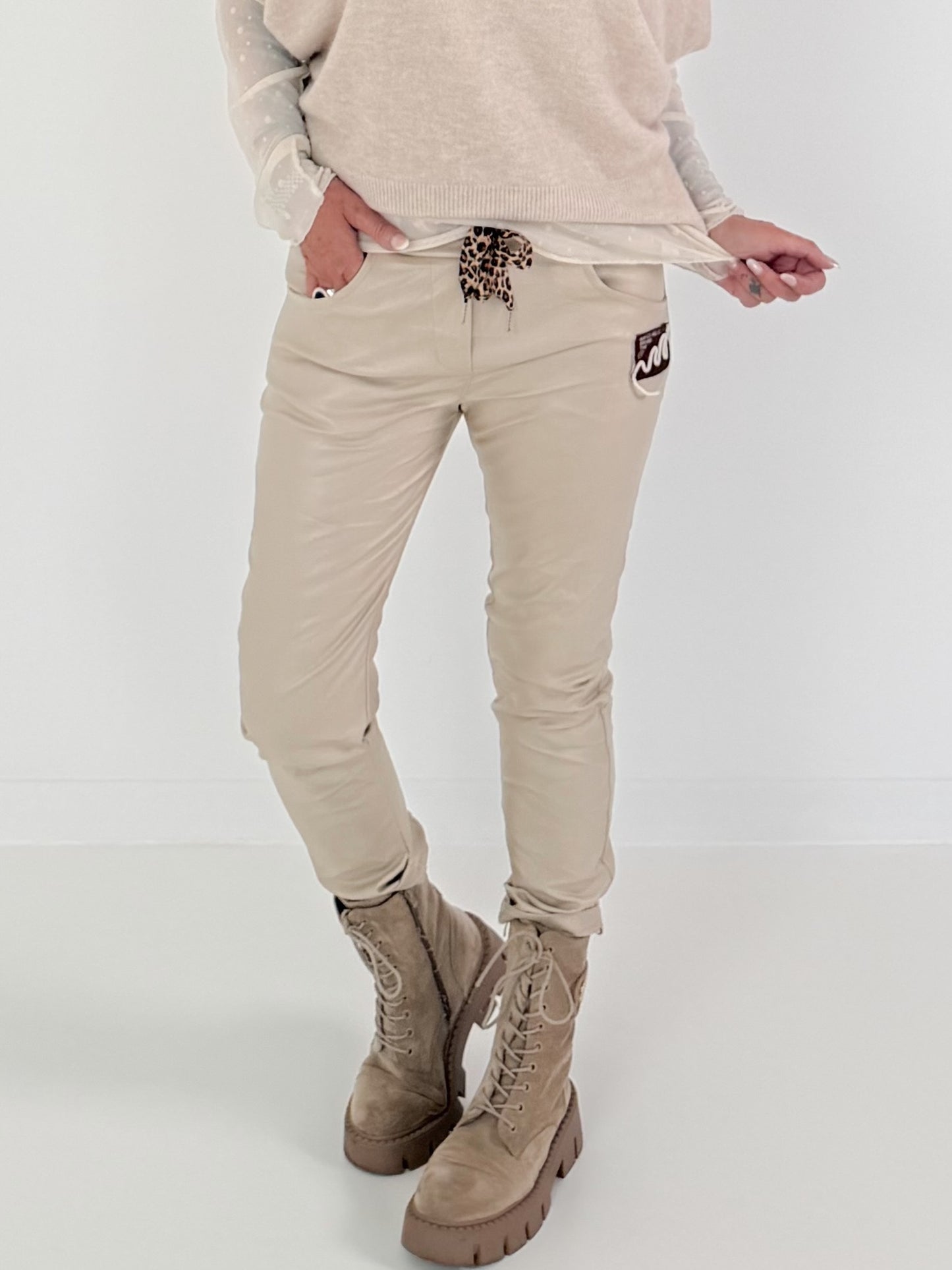 Vegan leather trousers with patch - beige